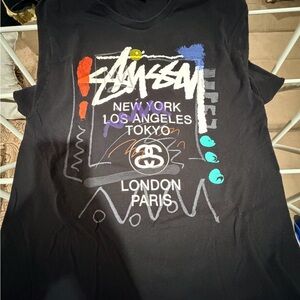 Stussy Black Tee with Vibrant Graphic